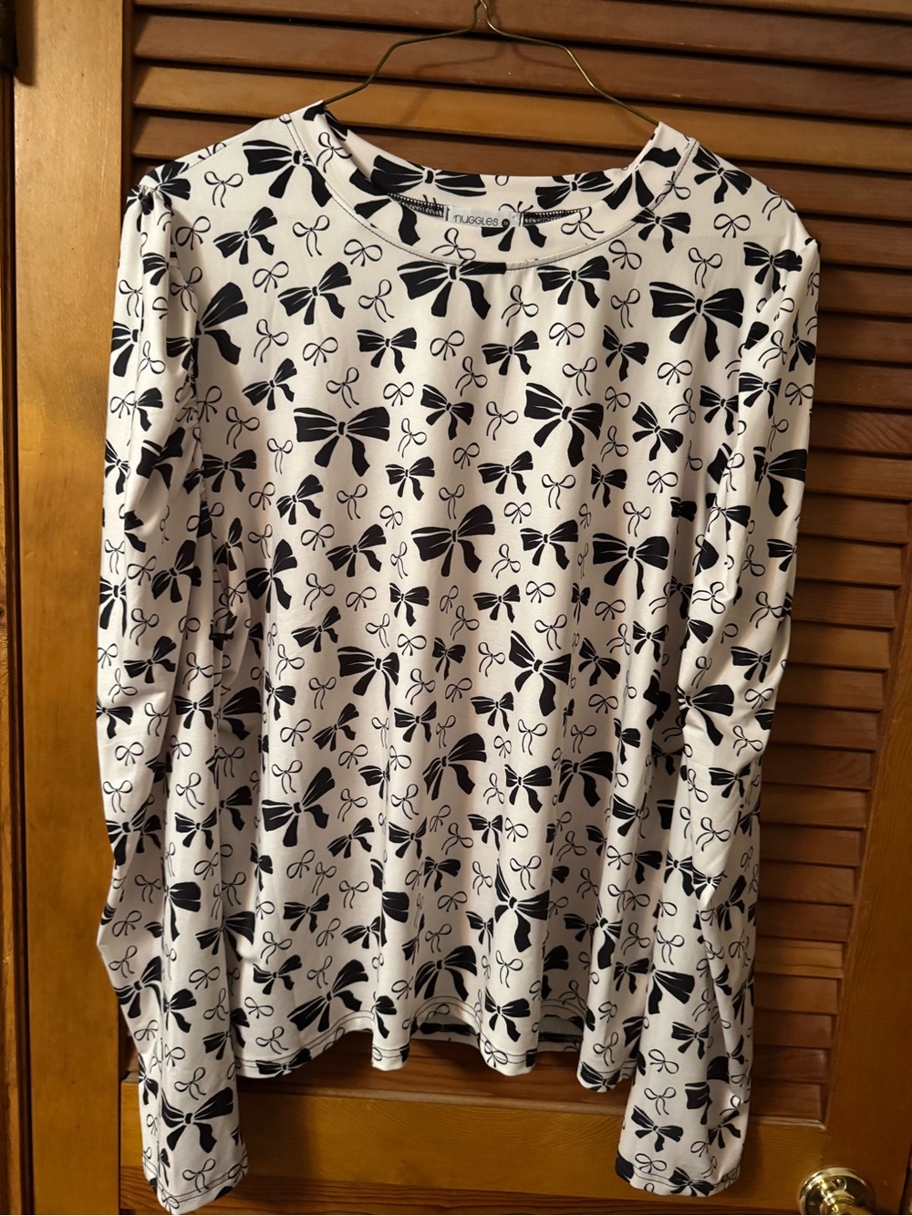White Long-Sleeve Top with Black Bow Print